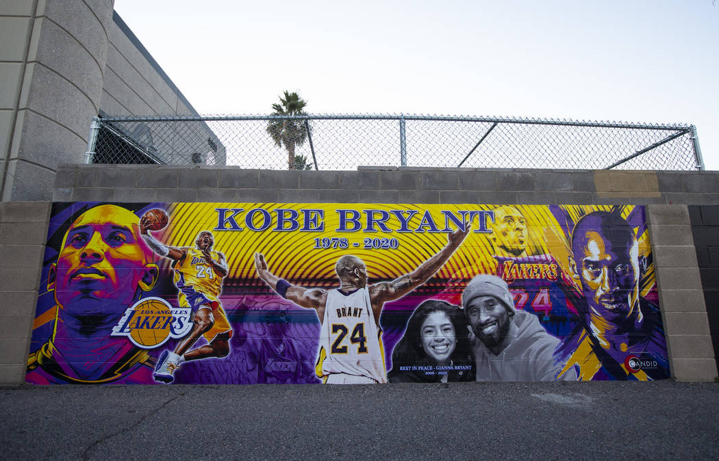 A mural of Kobe and Gianna Bryant, created by Eric Meidenbauer, outside of Candid Worldwide at ...