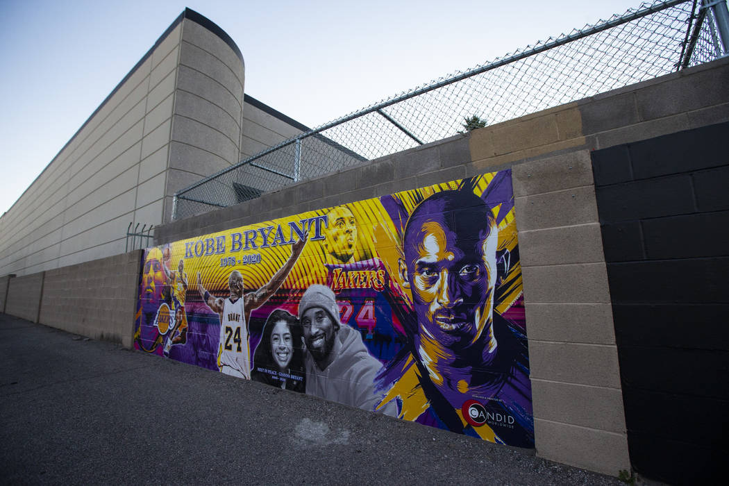 A mural of Kobe and Gianna Bryant, created by Eric Meidenbauer, outside of Candid Worldwide at ...