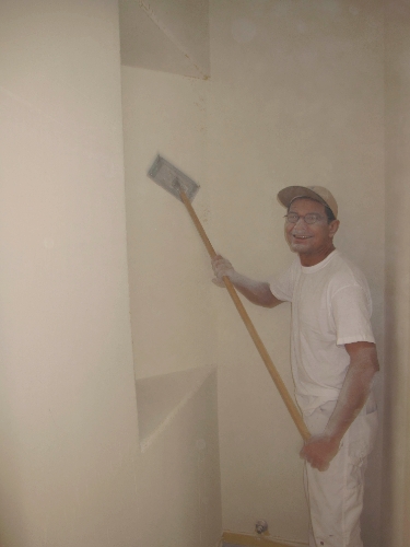 Skim Coating Smooths Over Rough Walls