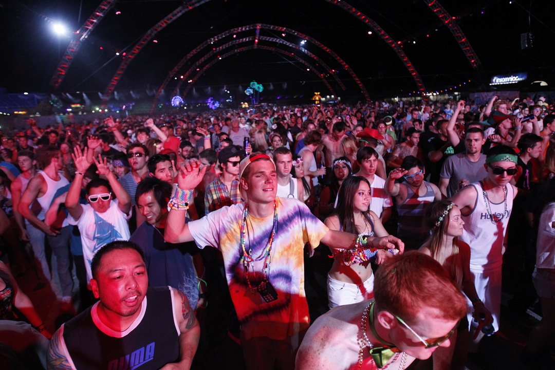 Attendees relax by the Tokyo Karaoke Bar during the second day of the  Electric Daisy Carnival a …