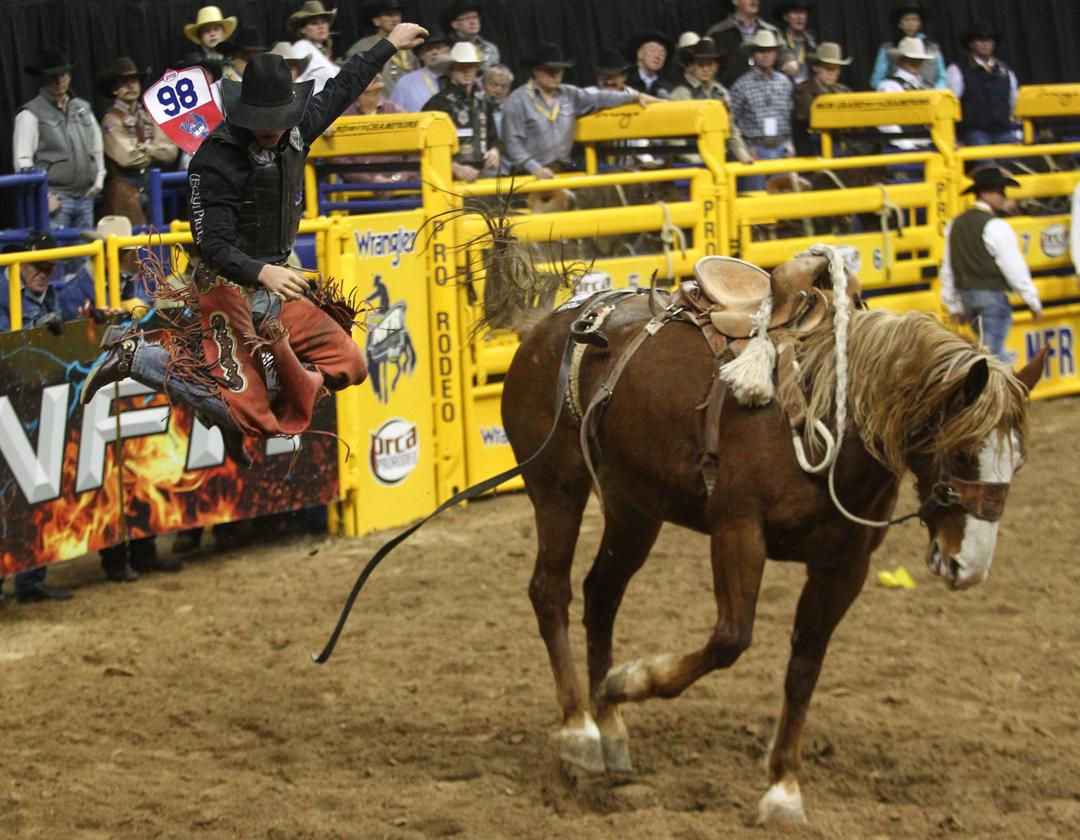 Saddle Bronc Riding in Round 6 of the NFR Las Vegas ReviewJournal