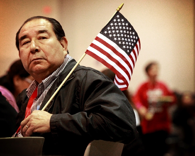 New York-New York worker Robert Salaiz rallies for immigration reform Monday at Cashman Center.