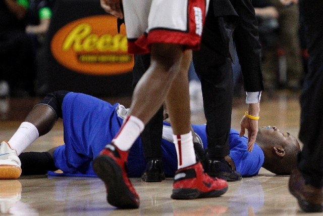 Air Force guard Michael Lyons lies on the court after he was injured during their NCAA Men’s basketball game against UNLV in the Mountain West Conference Tournament at the Thomas & Mack Cent ...