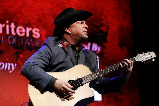 Garth Brooks, above, will be joined by George Strait for a tribute to Dick Clark.