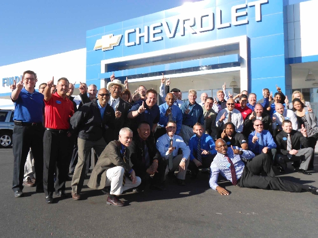 Members of Findlay Chevrolet’s staff celebrate receiving a Chevrolet Dealer of the Year award for the second consecutive year.