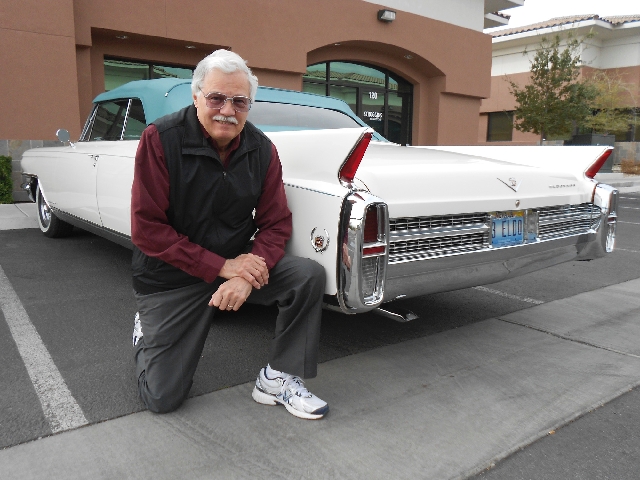 Las Vegas Cadillac LaSalle Club President Colin Christie poses by his 1963 Cadillac Eldorado convertible.