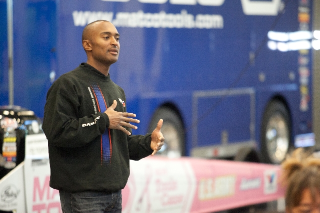 National Hot Rod Association drag racer Antron Brown talks with transportation technologies students and teachers at the College of Southern Nevada Cheyenne campus in North Las Vegas in October 2012.
