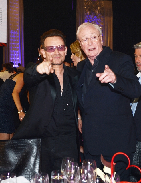 Bono enjoyed a moment with Michael Caine at the Keep Memory Alive/Power of Love benefit gala Saturday at the MGM Grand Garden.