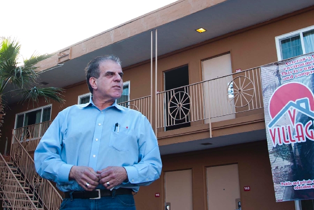 Arnold Stalk walks the grounds of Veterans Village, a former motel converted into temporary housing for homeless veterans at 1150 Las Vegas Blvd. South. During the next three years, Stalk hopes to ...