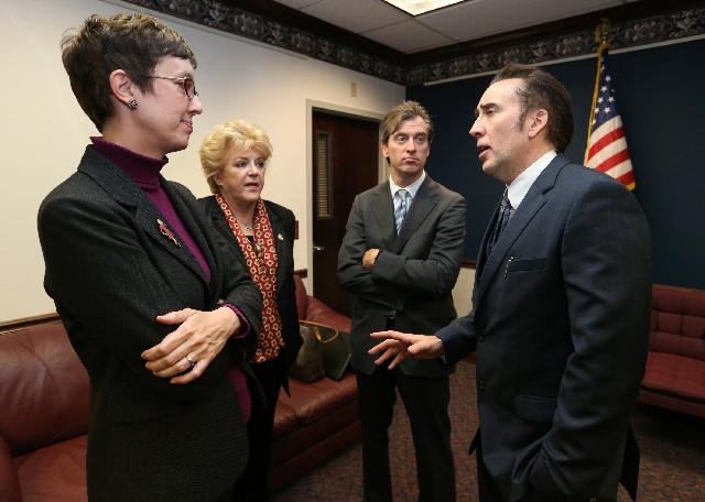 From left, Nevada Assemblywoman Heidi Swank, D-Las Vegas, Las Vegas Mayor Carolyn Goodman, Michael Nilon and actor Nicolas Cage talk at the Legislative Building Carson City, Nev. on Tuesday. Goodm ...