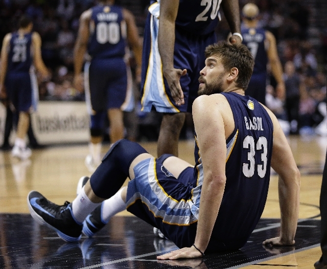 Memphis Grizzlies' Marc Gasol looks for a foul call after he fell to the floor during the second half in Game 1 of a Western Conference Finals NBA basketball playoff series against the San Antonio ...