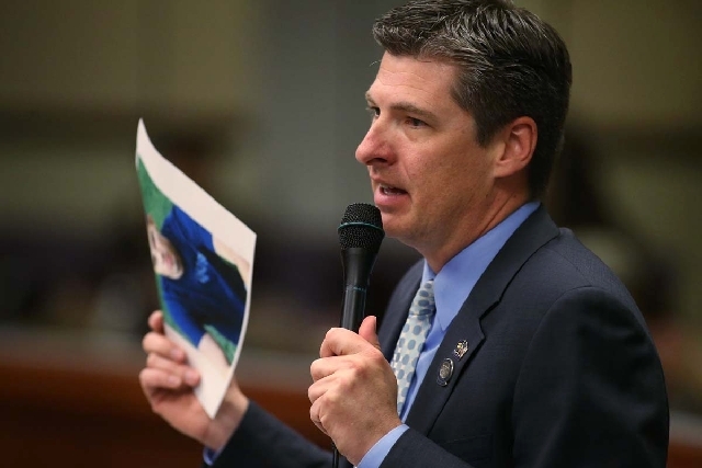Nevada Assemblyman James Healey, D-Las Vegas, speaks about his former partner who died in an accident in 2010, during an Assembly floor debate on gay marriage at the Legislative Building in Carson ...