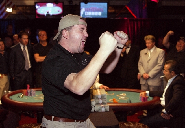 Chris Moneymaker of Spring Hill, Tenn., celebrates his World Series of Poker victory over Sam Farha, seated right, at Binion's Horseshoe on May 24, 2003. Moneymaker, who never had played in a live ...