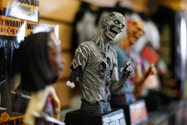Items from the AMC television and comic book series "The Walking Dead" are seen during the grand opening of Zombie Zone.