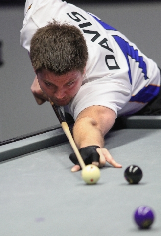 Las Vegas' Mike Davis lines up a shot against Toronto during a World Professional Billiard League game at the WPBL Arena, 6745 Surrey St., in Las Vegas on Sunday.