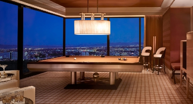 A pool table is one of the features in this three-bedroom suite at the Encore Hotel-Casino in Las Vegas, shown in this undated handout photo.