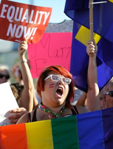 Dawn Malama cheers during the Supreme Court decision celebration rally at the The Gay and Lesbian Community Center of Southern Nevada on Wednesday.