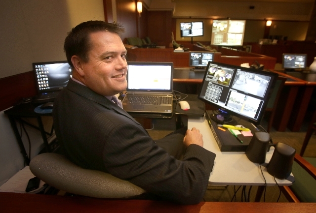 Brian Clark, trial and litigation support manager for Lawyer Solutions Group, displays graphics and information for juries to absorb while the attorney presents the case.