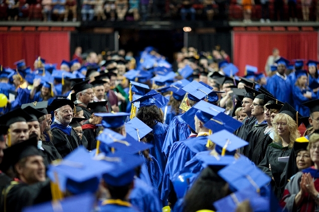 Students from the College of Southern Nevada graduate at the 2013 commencement ceremony. Nevada's community colleges are throwing out their existing framework for awarding employee raises based on ...