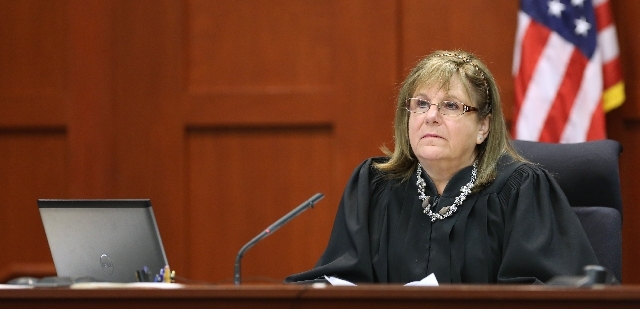 Judge Debra Nelson listens to testimony in the George Zimmerman trial in Seminole Circuit Court, in Sanford, Fla., Tuesday. Zimmerman is charged with second-degree murder in the fatal shooting of ...