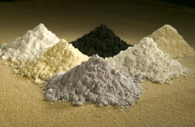 Rare-earth oxides, clockwise from top center: praseodymium, cerium, lanthanum, neodymium, samarium, and gadolinium