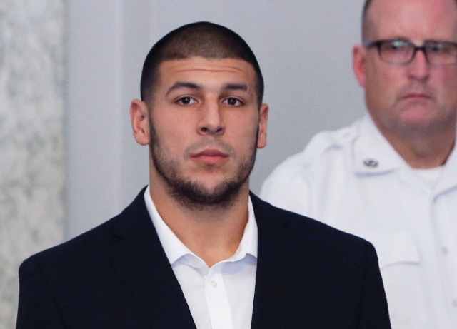 Former New England Patriots NFL football tight end Aaron Hernandez appears during a probable cause hearing at Attleboro District Court, on Wednesday in Attleboro, Mass.