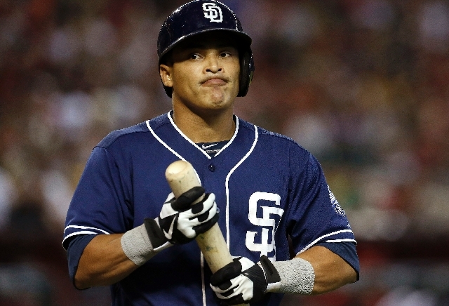 In this July 28, 2013 file photo, San Diego Padres' Everth Cabrera strikes out looking in the eighth inning of a baseball game against the Arizona Diamondbacks on in Phoenix. Major League Basebal ...