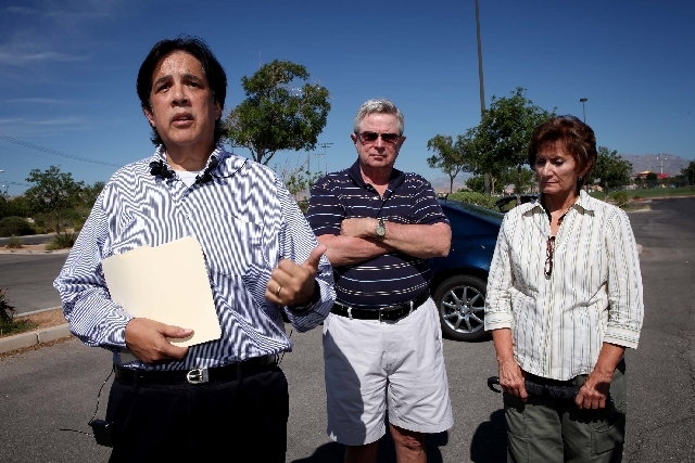 Robert Martinez, the civilian co-chair of the Las Vegas police Use of Force Board, left, speaks about his resignation from the board during a Wednesday press conference at Desert Breeze Soccer Com ...