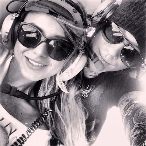 DJ Ashba, lead guitarist of Guns N' Roses, posted this photo of himself and his girlfriend during a private tour of Las Vegas in a police helicopter.