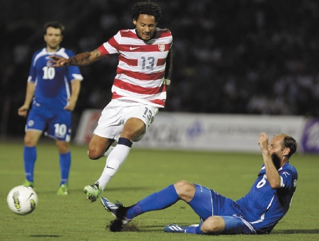 Bosnia's Elvir Rahimic, right, is challenged by Jermanie Jones of USA during their friendly soccer match in Sarajevo, Bosnia, on Wednesday.