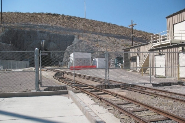 A fence surrounds the north entrance to the 5-mile tunnel that loops through Yucca Mountain, 100 miles northwest of Las Vegas.