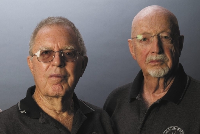 T.D. Barnes, left, and Roger Andersen worked as Central Intelligence Agency contractors at the classified installation known as Area 51 along the dry Groom Lake bed during development of the A-12  ...