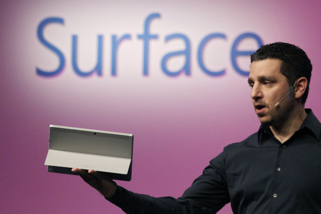 Panos Panay, corporate vice president of Microsoft, introduces a Surface 2 tablet with an integrated kickstand, Monday, Sept. 23, 2013 in New York. Microsoft says the Pro 2 also offers a 75 percen ...