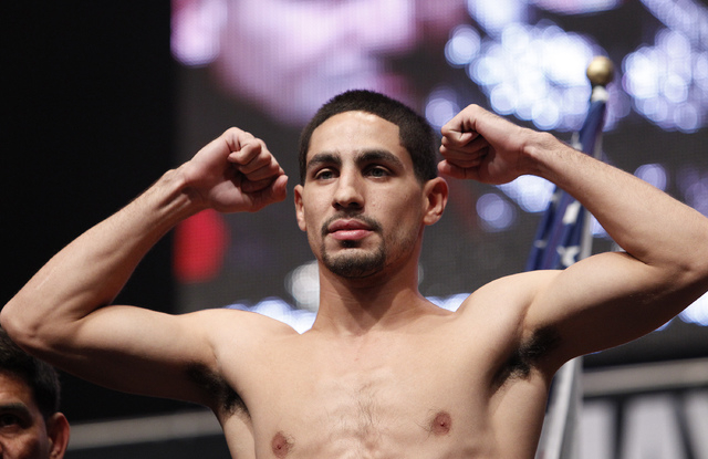 Danny Garcia poses during a weigh in at the MGM Grand in Las Vegas Friday, Sept. 13, 2013. Garcia will fight Lucas Matthysse Saturday in a super lightweight title bout at the MGM Grand. (John Loch ...