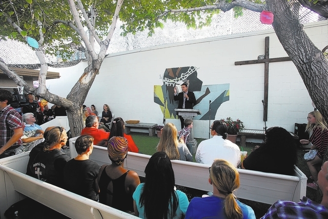 Pastor Chris Chapel speaks during the grand reopening and ribbon cutting ceremony at the Casa De Luz church in the Naked City area of Las Vegas on Thursday, Sept. 12, 2013. (Chase Stevens/Las Vega ...