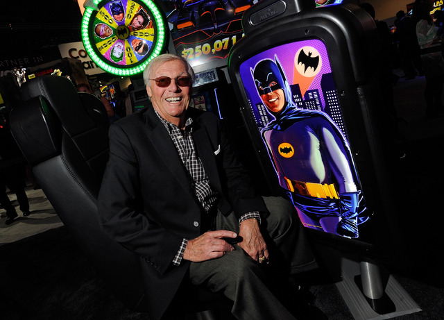Adam West appears at the Aristocrat Technology booth to unveil the Batman slot machine during G2E at the Sands Expo and Convention Center on Wednesday, Sept. 25, 2013. West was the actor who portr ...
