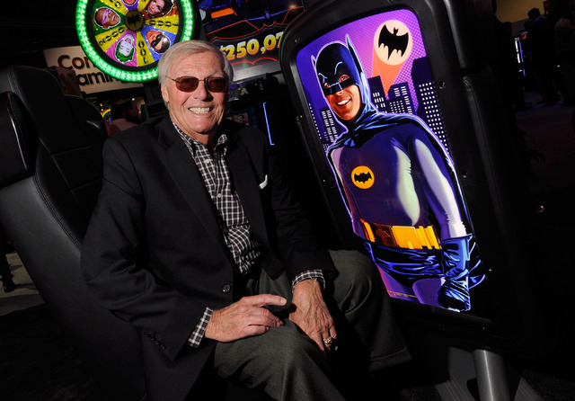 Adam West appears at the Aristocrat Technology booth to unveil the Batman slot machine during G2E at the Sands Expo and Convention Center on Wednesday, Sept. 25, 2013. West was the actor who portr ...