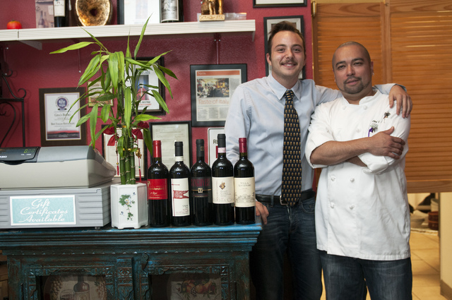 Riccardo Santamaria, left, and Sonny Santino, co-owners of Gina's Bistro, pose for a photograph at their restaurant, Saturday, Sept. 21, 2013, in Las Vegas, Nev. (Erik Verduzco/Las Vegas Review-Jo ...