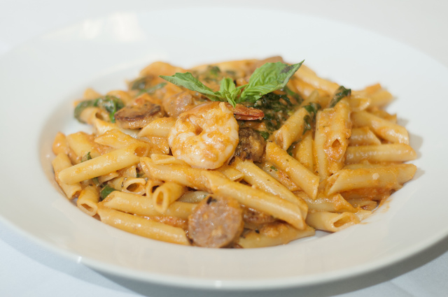 Gina's Bistro daily special is seen served with penne pasta, pink vodka sauce, sausage pancetta, spinach and fresh shrimp, Saturday, Sept. 21, 2013, in Las Vegas, Nev. (Erik Verduzco/Las Vegas Rev ...