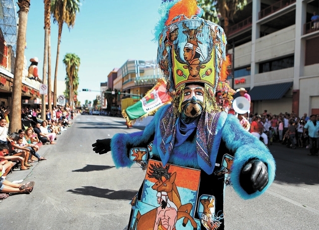 A Brinco del Chinelo dancer performs during the Fiesta Las Vegas Latino Parade Saturday, Sept. 14, 2013, in Las Vegas. The parade, which traveled north on 4th Street downtown past the Fremont Stre ...