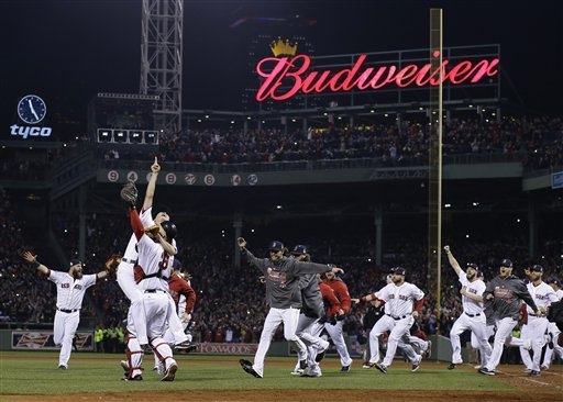 Boston Red Sox relief pitcher Koji Uehara and catcher David Ross celebrate  after getting St. Louis Cardinals' Matt Carpenter to strike out and end  Game 6 of baseball's World Series Wednesday, Oct. …