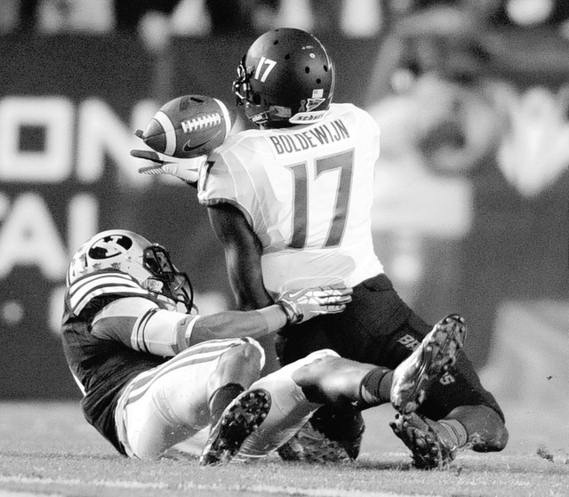 Boise State Broncos wide receiver Geraldo Boldewijn (17) is unable to make a catch as Brigham Young Cougars defensive back Robertson Daniel (4) defends during a game at Lavell Edwards Stadium on F ...