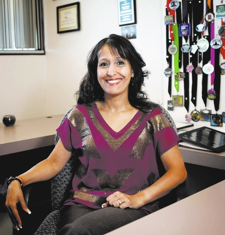 Dr. Anjala Krishen is in her office at the Lee Business School at UNLV in Las Vegas Tuesday, Oct. 1, 2013. (Jessica Ebelhar/Las Vegas Review-Journal)