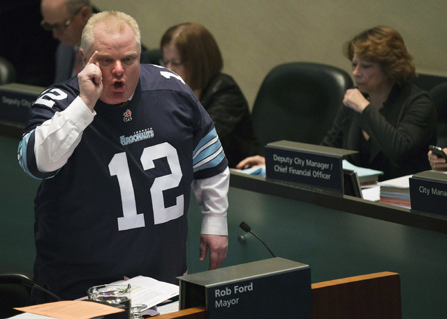 Mayor Rob Ford speaks to city council members about new allegations against him in Toronto on Thursday, Nov. 14, 2013. (AP Photo/The Canadian Press, Nathan Denette)