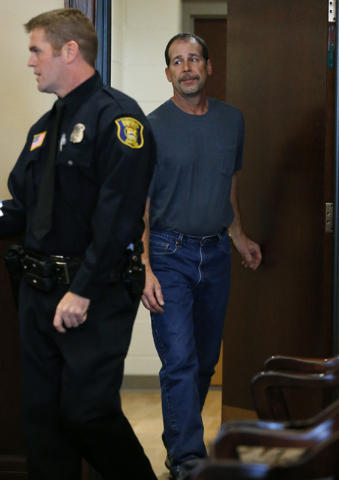 Theodore P. Wafer, 54, of Dearborn Heights, appears at his arraignment in 20th District Court in Deaborn Heights, Mich., Friday, Nov. 15, 2013. Wafer faces second-degree murder and manslaughter ch ...