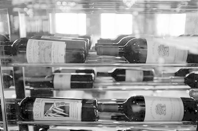 In this Tuesday, Oct. 29, 2013 photo, bottles of California wine are displayed inside the 630 Park Steakhouse at the Graton Resort and Casino in Rohnert Park, Calif.  The Las Vegas-style Indian ca ...