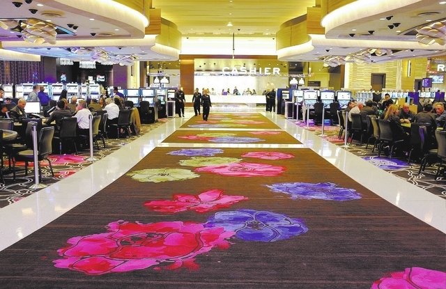 In this Tuesday, Oct. 29, 2013 photo, patterns inspired by Sonoma County flowers are shown on a custom-woven carpet inside the Graton Resort and Casino in Rohnert Park, Calif.  The Las Vegas-style ...