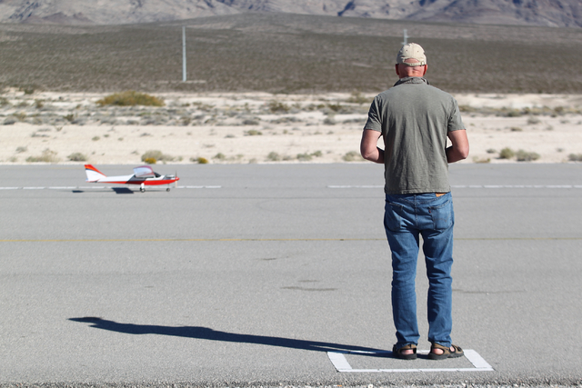 Bob Lowe prepares his radio controlled plane to fly at the Willie McCool Regional Airfield, home to the Prop Nuts Radio Controlled Airplane Club of North Las Vegas, on Saturday, Nov. 9, 2013. The  ...