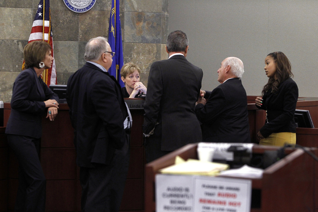 Judge Linda Marie Bell speaks with attorneys during a break in O.J. Simpson's evidentiary hearing in Clark County District Court on Friday, May 17, 2013 in Las Vegas. Simpson, who is currently ser ...