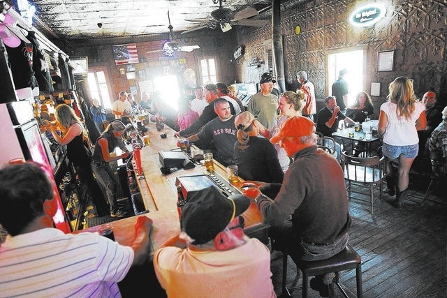 Patrons enjoy the atmosphere during the 100th birthday celebration for the Pioneer Saloon in Goodsprings on Oct. 19. (Jason Bean/Las Vegas Review-Journal)